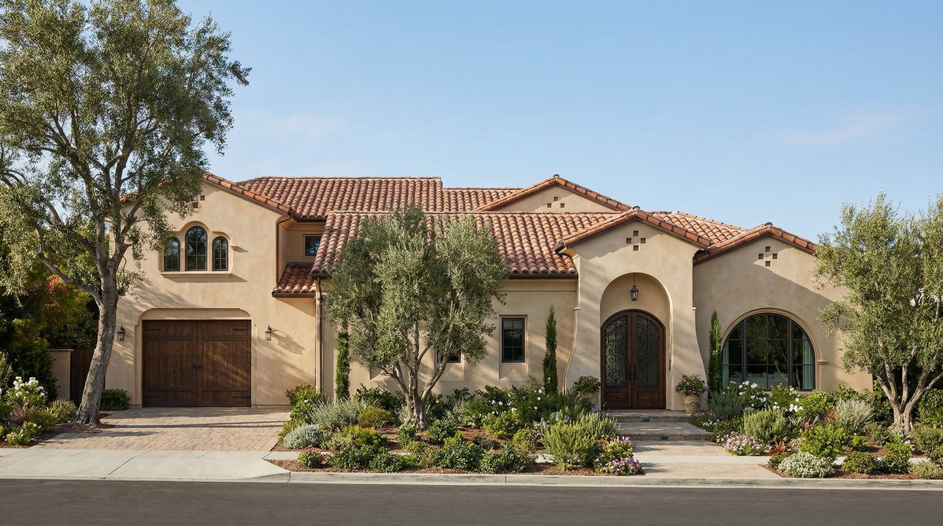 Spanish Colonial + Red Tile Roof designed by Hyden Design Group.
